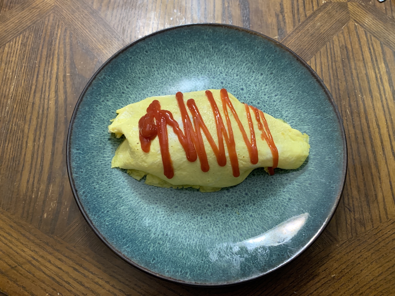 Omrice. tomato ketchup based fried rice wrapped with egg