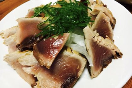 Surface grilled Bonito (skipjack tuna) and perilla leaves on top.