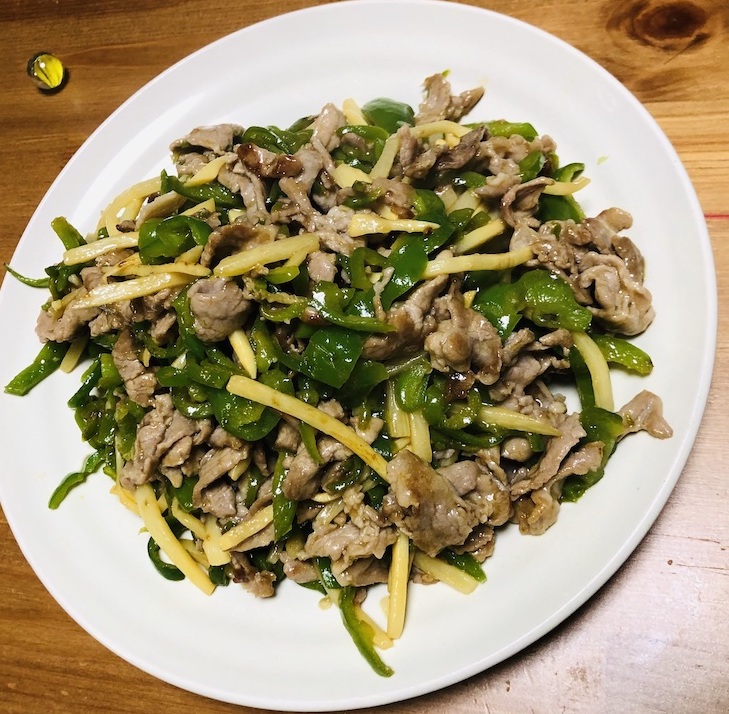 Pork Chinjao Rosu, stir fried pork and green and yellow bell peppers