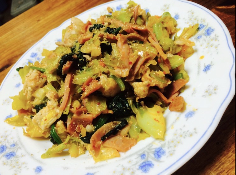 Pork rib slice, cabbage, and spinach stir fry with chili oil