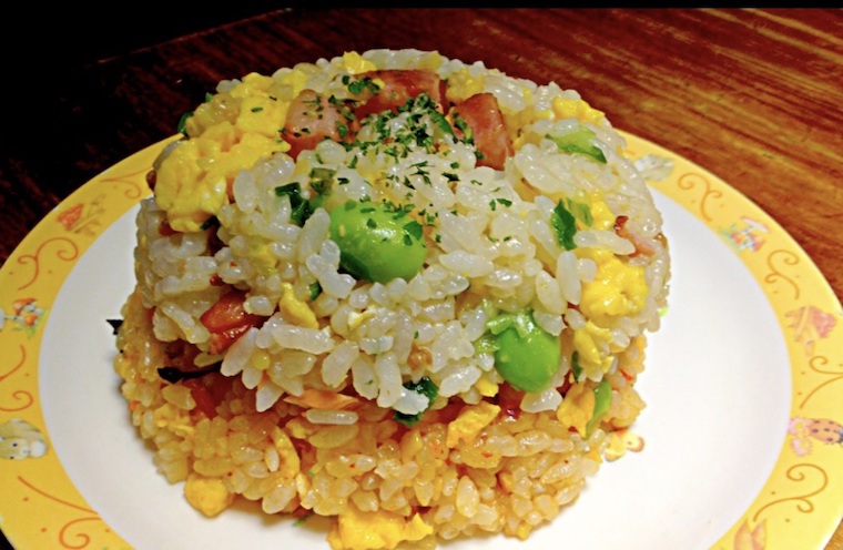 Regular fried rice on top of kimchi fried rice as tower.